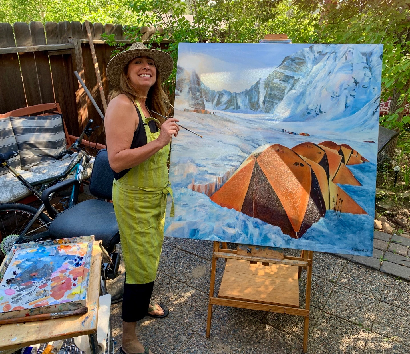Julie Grundtner with her painting Base Camp in progress